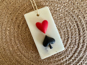 Decorative Diwali wax sachets with  red heart and black spade.