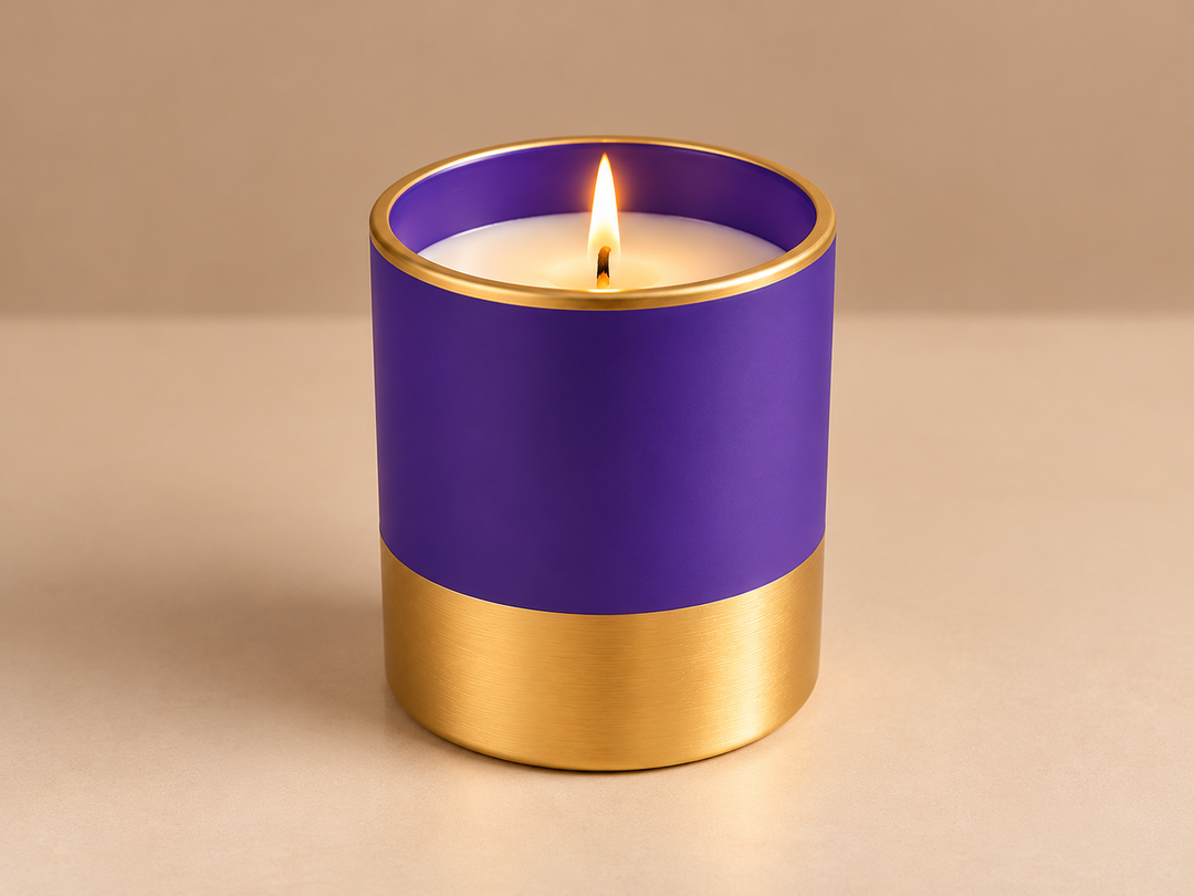 Petrichor Bloom Gilli Mitti scented candle in a purple jar with elegant gold detailing and a metallic gold base by Apsaa Living.