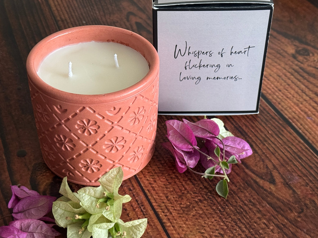 Minimal concrete scented candle styled in elegant modern home decor setting