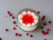 Luxury dessert-inspired candle with fruity pomegranate fragrance