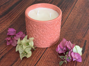 Hand-poured soy wax candle inside modern concrete jar container