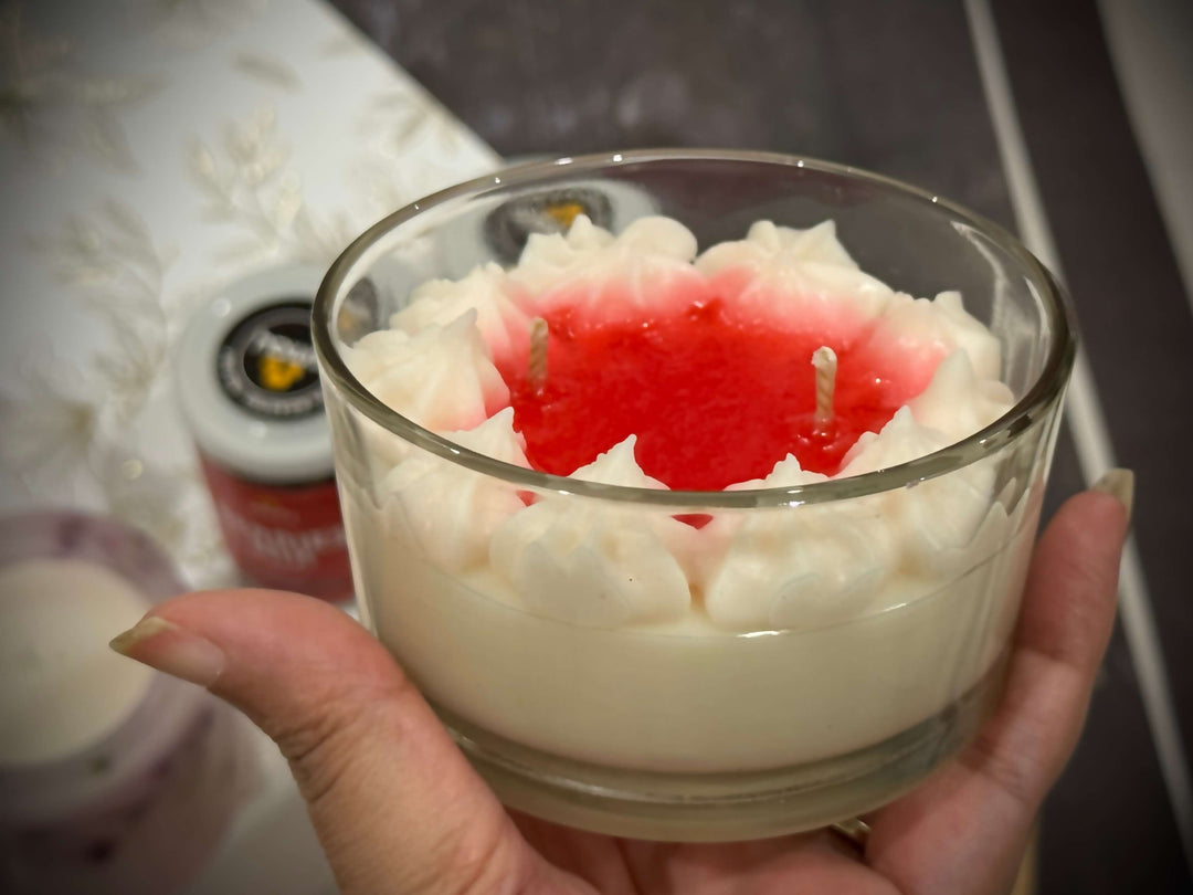 Close-up of handcrafted dessert candle with whipped wax detailing