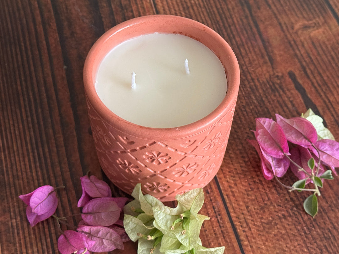Twilight amber and lemongrass candle glowing with warm relaxing ambiance