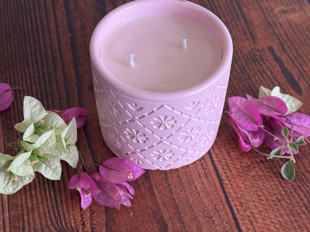 Minimal concrete jar scented candle styled in elegant modern home decor setting