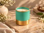 Turquoise Bloom Spicy Bergamot scented candle featuring a turquoise jar, elegant gold-tone rim, and metallic gold base by Apsaa Living.
